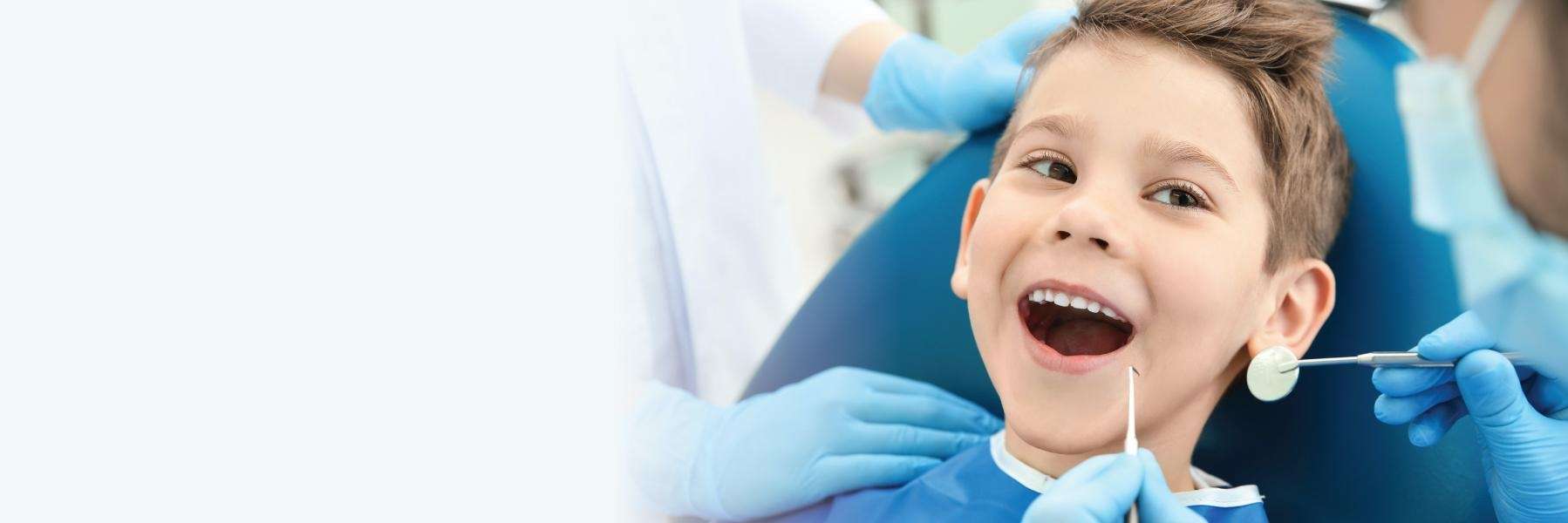 A smiling child getting a dental clean | children's dental clean Raymond Terrace